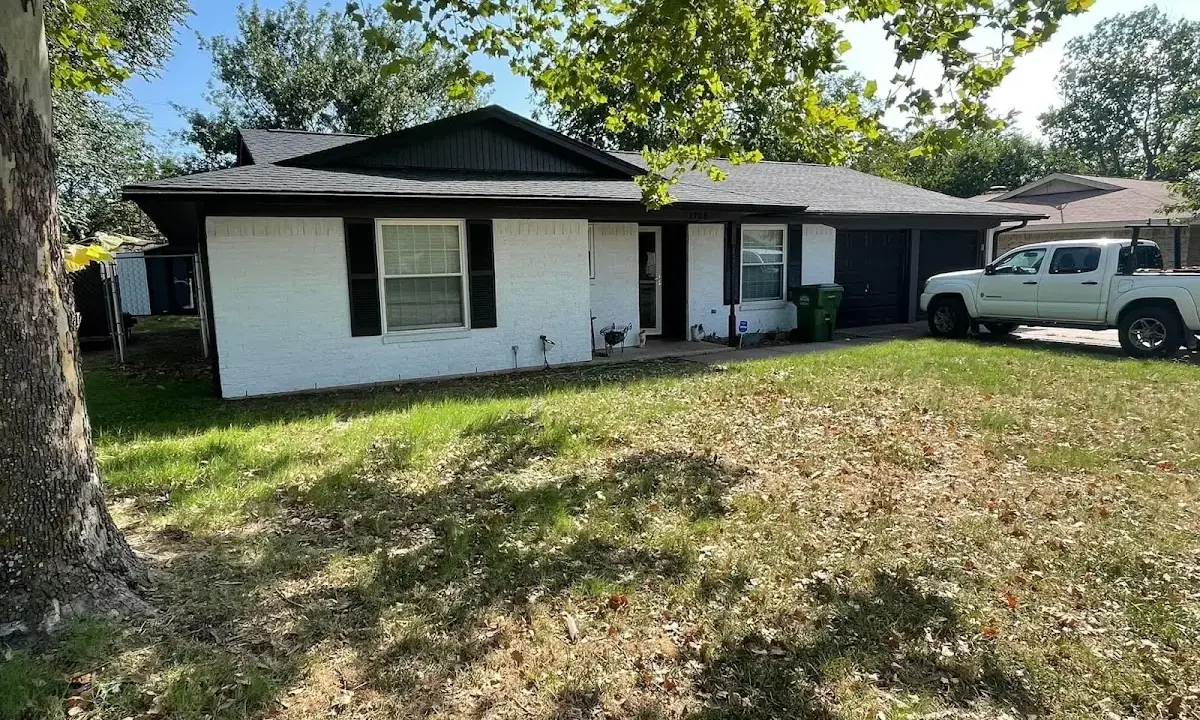 Professional roofing crew working on a residential roof in Westlake Village